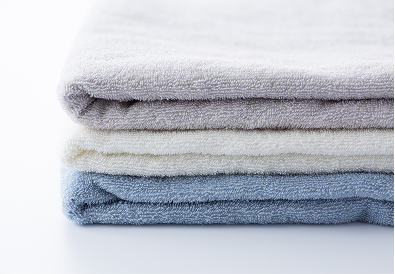 自社クリーニング工場にて洗濯・管理